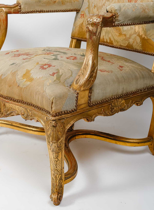 Pair of Regency-style armchairs in gilded wood, late 19th century