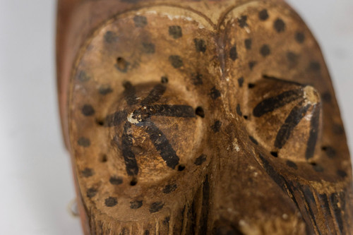 African "Kuba Babuka" mask in wood and pigments. 20th century.
