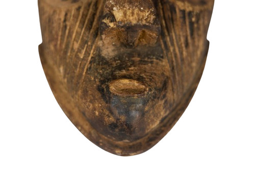 African "Kuba Babuka" mask in wood and pigments. 20th century.
