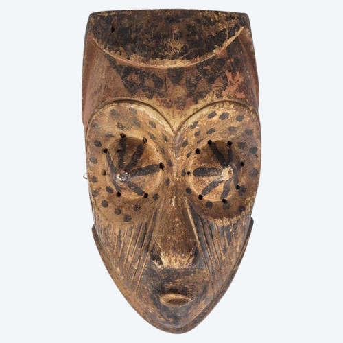 African "Kuba Babuka" mask in wood and pigments. 20th century.