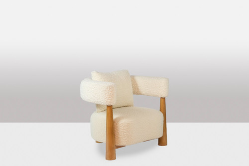 Pair of bean-shaped armchairs in blond beech. Contemporary work.