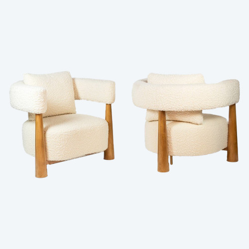 Pair of bean-shaped armchairs in blond beech. Contemporary work.