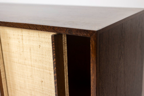 Sideboard in wenge, raffia and lacquered metal. 1970s.