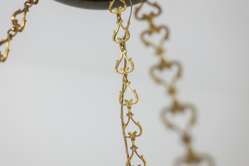Casa Baguès. Lampadario in bronzo dorato stile impero. 1950 circa.