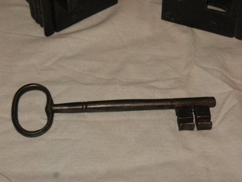 Wrought iron fortified house lock with key 18th century total length: 41 cm