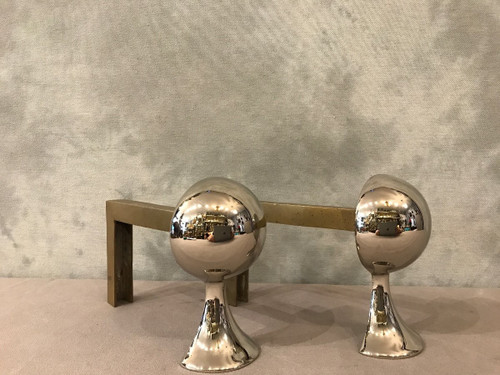 Small modernist andirons in chromed metal circa 1970