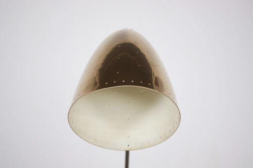 Modernist floor lamp in the Paavo Tynell style.