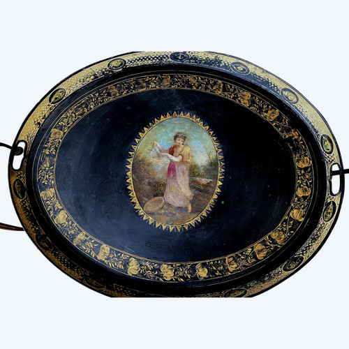 Exceptional large Napoleon III tray, oval painted sheet metal, decorated with gilded friezes and a painted scene.