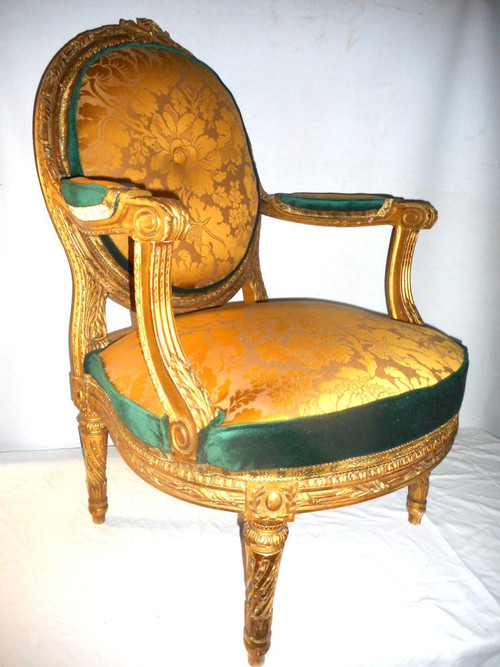 Suite Of Four Large Armchairs Early 19th Century In Gilded Wood