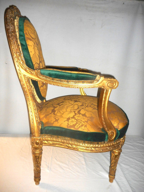 Suite Of Four Large Armchairs Early 19th Century In Gilded Wood