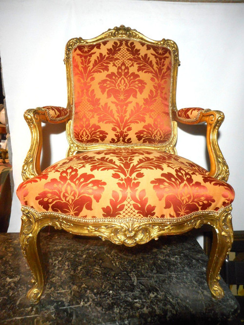 Set di quattro poltrone in legno dorato del XIX secolo