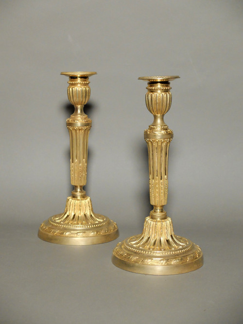 Pair of Louis XVI ormolu candlesticks