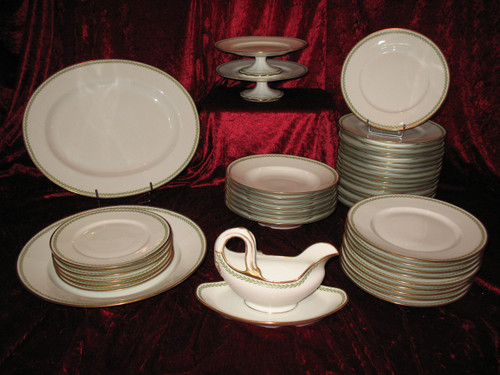 Porcelain service decorated with laurel friezes, Empire style, early 20th century.
