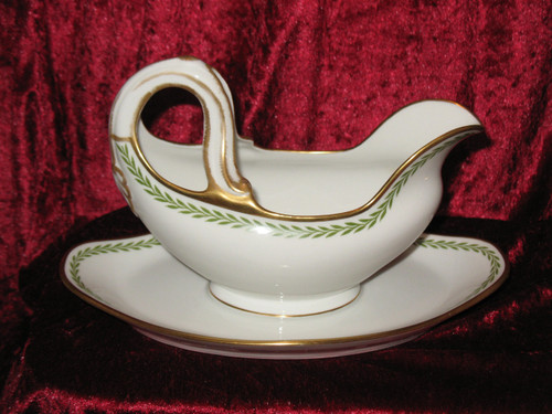Porcelain service decorated with laurel friezes, Empire style, early 20th century.