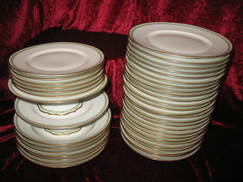 Porcelain service decorated with laurel friezes, Empire style, early 20th century.