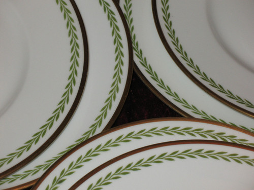 Porcelain service decorated with laurel friezes, Empire style, early 20th century.