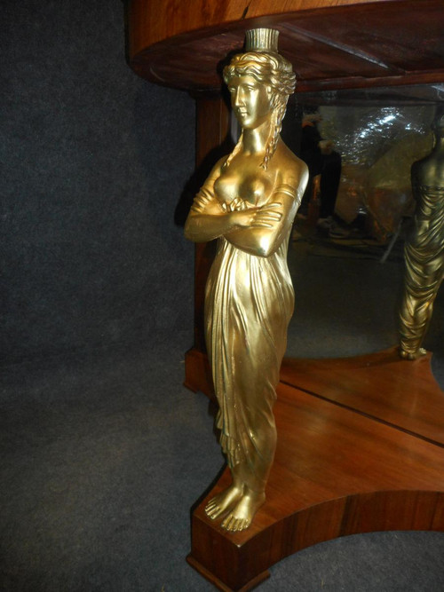 Coppia di console in mogano primo impero e cariatidi in bronzo dorato attribuite a Jacob