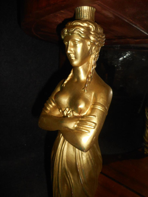 Coppia di console in mogano primo impero e cariatidi in bronzo dorato attribuite a Jacob