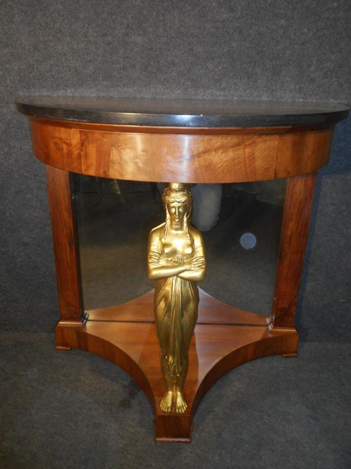 Coppia di console in mogano primo impero e cariatidi in bronzo dorato attribuite a Jacob