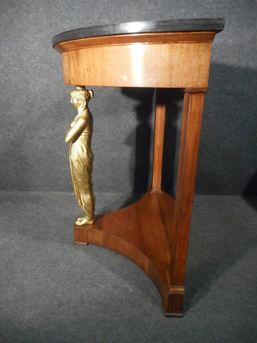 Coppia di console in mogano primo impero e cariatidi in bronzo dorato attribuite a Jacob