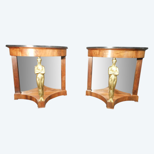 Coppia di console in mogano primo impero e cariatidi in bronzo dorato attribuite a Jacob