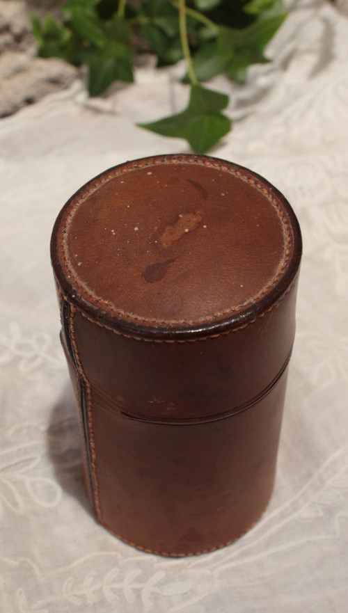 4 large bottles in leather case early 20th century