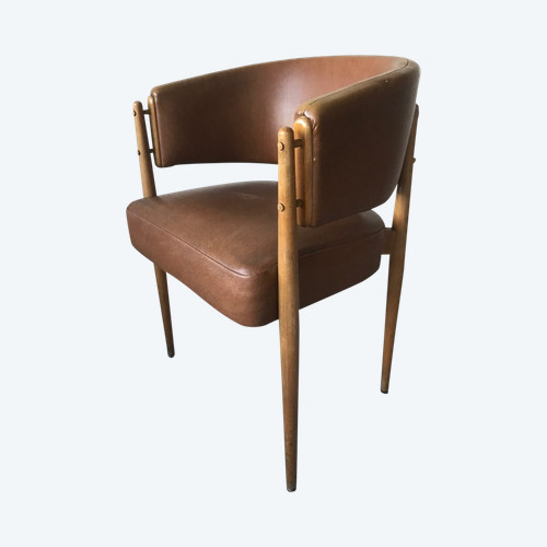 Poltrona in similpelle marrone circa 1950.