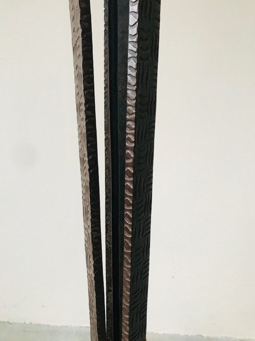 Art Deco wrought-iron floor lamp with flower design, circa 1930.