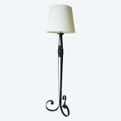 Art Deco wrought-iron floor lamp with flower design, circa 1930.