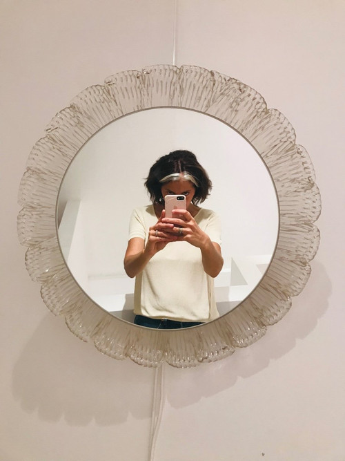 Miroir rond lumineux des années 70.