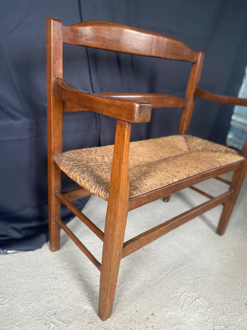 Fireplace bench with backrest dating from the 19th century