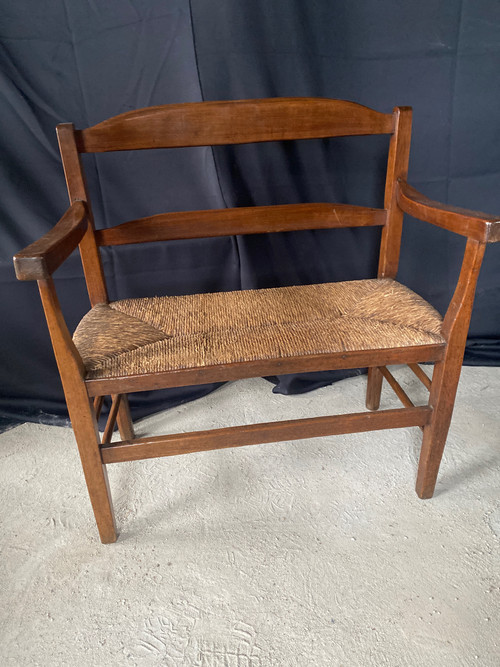 Fireplace bench with backrest dating from the 19th century