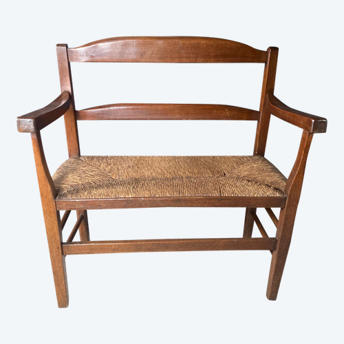 Fireplace bench with backrest dating from the 19th century