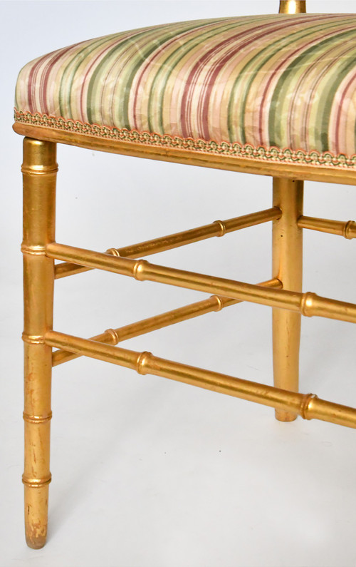 Pair of bamboo-style gilded wood chairs