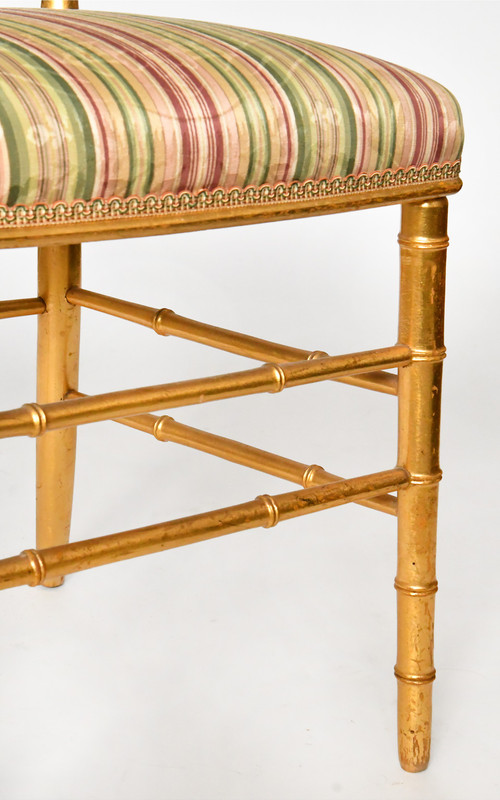 Pair of bamboo-style gilded wood chairs