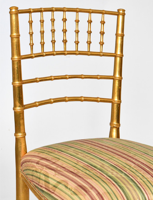 Pair of bamboo-style gilded wood chairs