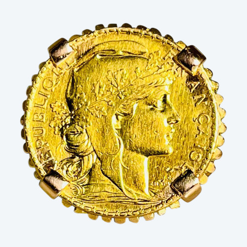 Anello in oro da 20 franchi.