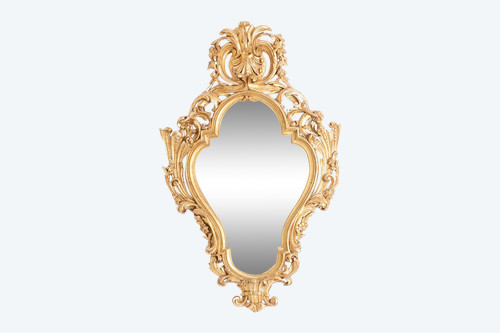 Regency style mirror in carved and gilded wood. 1950s.