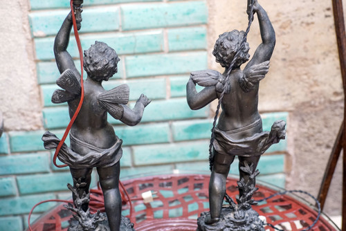 ANGES, "CHARMEUR" et "VAINQUEUR", par Ernest RANCOULET, paire de lampes flammes, régule
