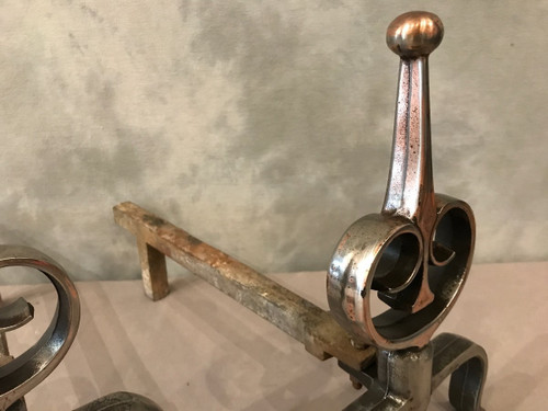 Pair of antique polished cast iron andirons, 20th century