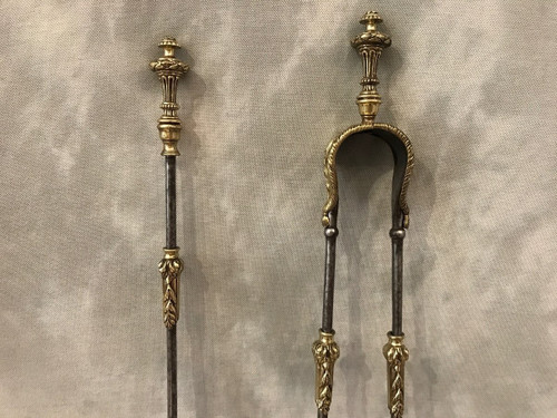 Set of an iron and bronze shovel and tongs, 19th century