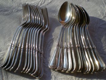 12 solid silver dessert cutlery