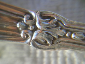 12 solid silver dessert cutlery