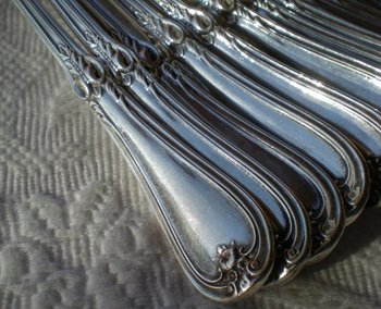 12 solid silver dessert cutlery