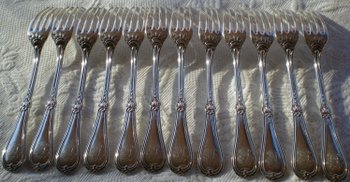 12 solid silver dessert cutlery