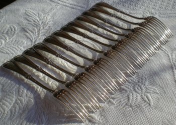 12 solid silver dessert cutlery