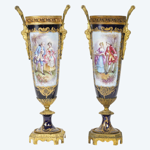 A pair of late 19th century sèvres blue porcelain vases