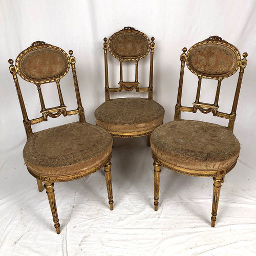 Série de trois chaises de style Louis XVI en bois doré, vers 1900