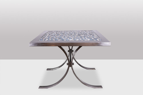Dining room table in polished metal and ceramic. 1970s.