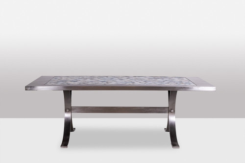 Dining room table in polished metal and ceramic. 1970s.